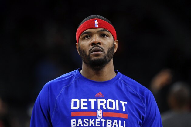 FILE  - This Dec. 9, 2014 file photo shows Detroit Pistons' Josh Smith warming up before an NBA basketball game against the Portland Trail Blazers in Auburn Hills, Mich. The Detroit Pistons announced Monday, Dec. 22, 2014 the club has requested waivers on Josh Smith. (AP Photo/Paul Sancya)