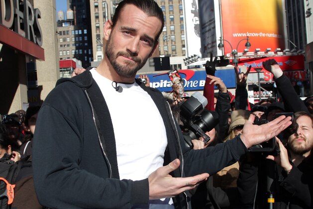 WWE Superstar CM Punk poses at Madison Square Garden, Friday, Nov. 18, 2011, in New York, during a rally leading up to the 25th Anniversary of Survivor Series, taking place Sunday at Madison Square Garden.  The event will feature actor and wrestling favorite Dwayne