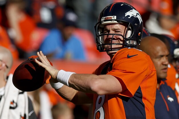 Denver Broncos quarterback Peyton Manning throws during warms ups before an NFL football game Sunday, Dec. 7, 2014, in Denver. (AP Photo/David Zalubowski)