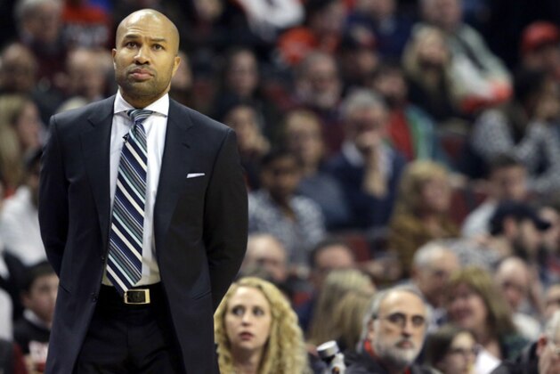 New York Knicks head coach Derek Fisher, watches his team during the first half of an NBA basketball game against the Chicago Bulls in Chicago on Thursday, Dec. 18, 2014. (AP Photo/Nam Y. Huh)