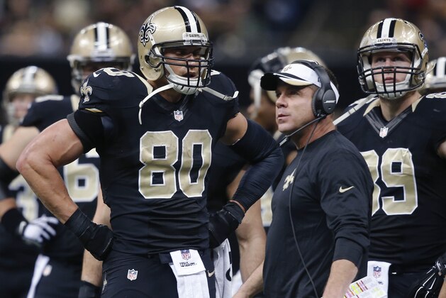 New Orleans Saints tight end Jimmy Graham (80) talks to head coach Sean Payton in the second half of an NFL football game against the Atlanta Falcons in New Orleans, Sunday, Dec. 21, 2014. (AP Photo/Bill Haber)