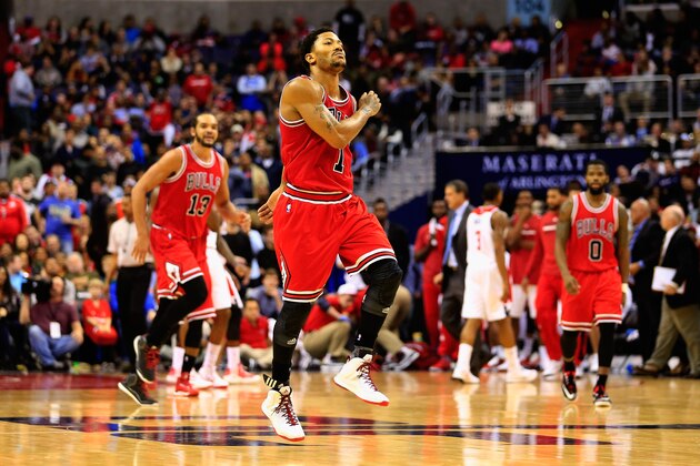 WASHINGTON, DC - DECEMBER 23: Derrick Rose #1 of the Chicago Bulls celebrates after making a shot in the second half of the Bulls 99-91 win over the Washington Wizards at Verizon Center on December 23, 2014 in Washington, DC. NOTE TO USER: User expressly acknowledges and agrees that, by downloading and or using this photograph, User is consenting to the terms and conditions of the Getty Images License Agreement.  (Photo by Rob Carr/Getty Images)