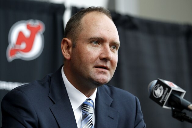 Peter DeBoer is seen during a press conference in which he was announced as the new head coach of the New Jersey Devils, Tuesday, July 19, 2011, in Newark, N.J. (AP Photo/Julio Cortez)