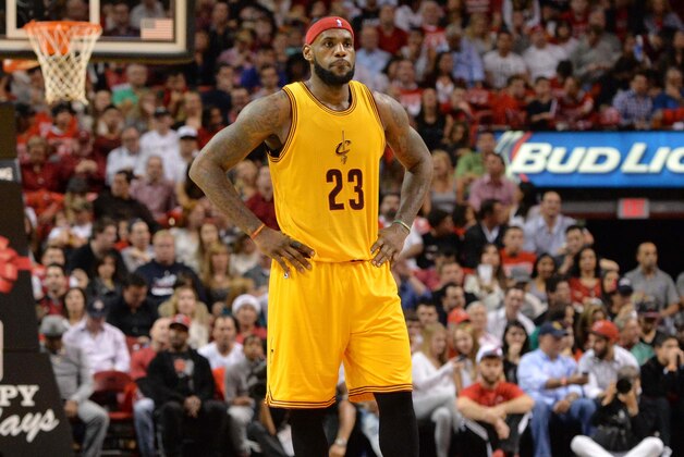 Dec 25, 2014; Miami, FL, USA; Cleveland Cavaliers forward LeBron James (23) reacts during the first half against the Miami Heat at American Airlines Arena. Mandatory Credit: Steve Mitchell-USA TODAY Sports
