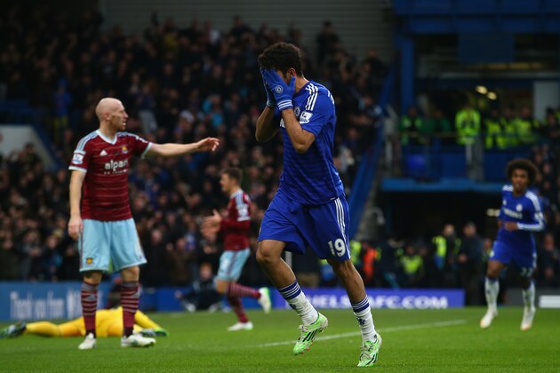 LONDON, ENGLAND - DECEMBER 26:  Diego Costa of Chelsea celebrates scoring their second goal during the Barclays Premier League match between Chelsea and West Ham United at Stamford Bridge on December 26, 2014 in London, England.  (Photo by Clive Rose/Getty Images)