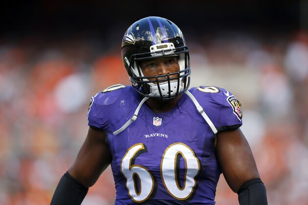 Baltimore Ravens tackle Eugene Monroe (60) walks to the locker room during an NFL game at the FirstEnergy Stadium in Cleveland on Sunday, Sept. 21, 2014. (Jeff Haynes/AP Images for Panini)