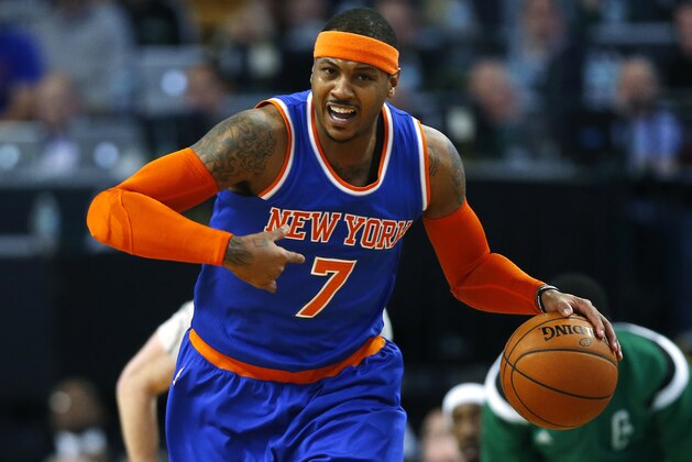 New York Knicks' Carmelo Anthony during the second half of the New York Knicks 101-95 win over the Boston Celtics in an NBA basketball game in Boston Friday, Dec. 12, 2014. (AP Photo/Winslow Townson)