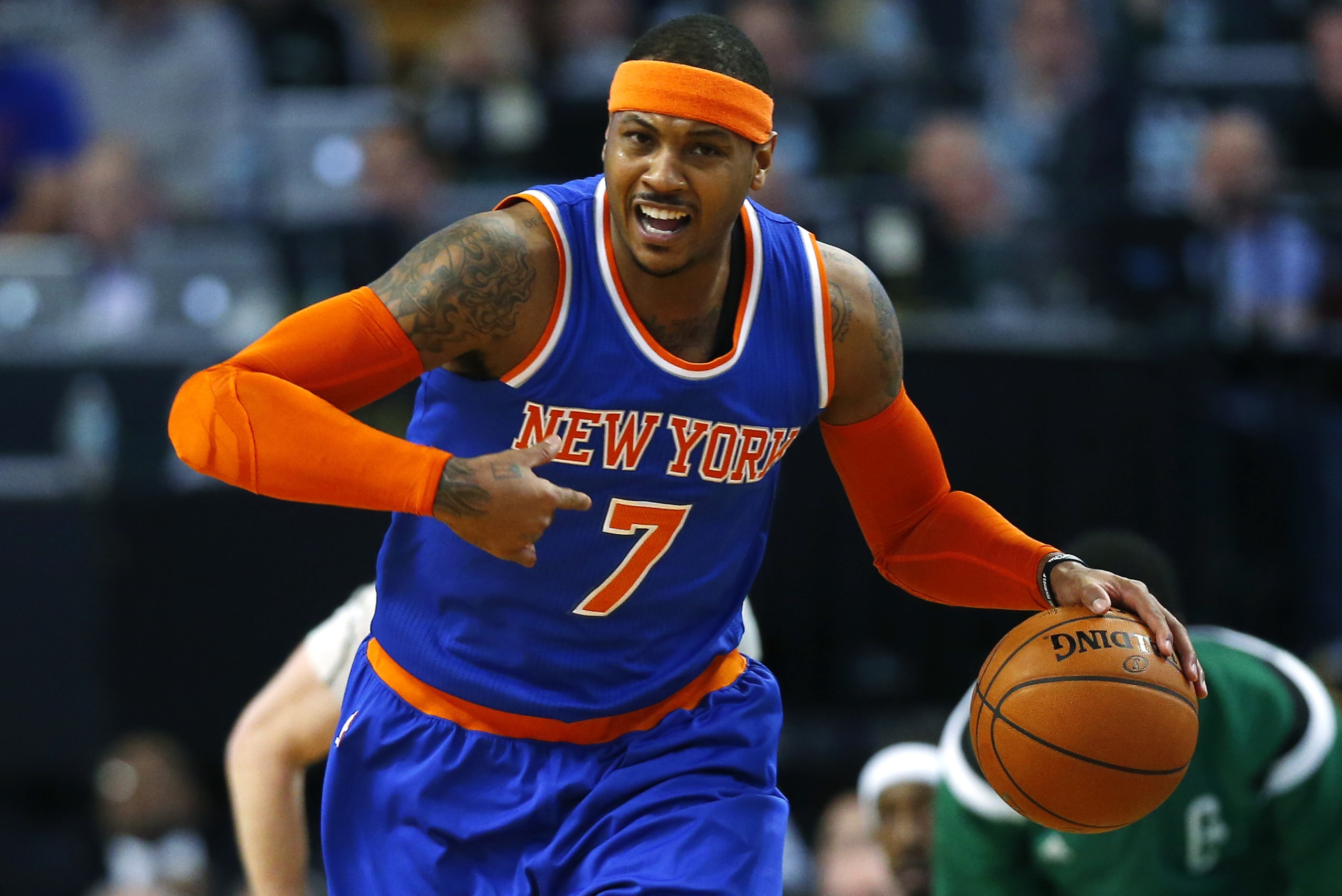 New York Knicks' Carmelo Anthony during the second half of the New York Knicks 101-95 win over the Boston Celtics in an NBA basketball game in Boston Friday, Dec. 12, 2014. (AP Photo/Winslow Townson)