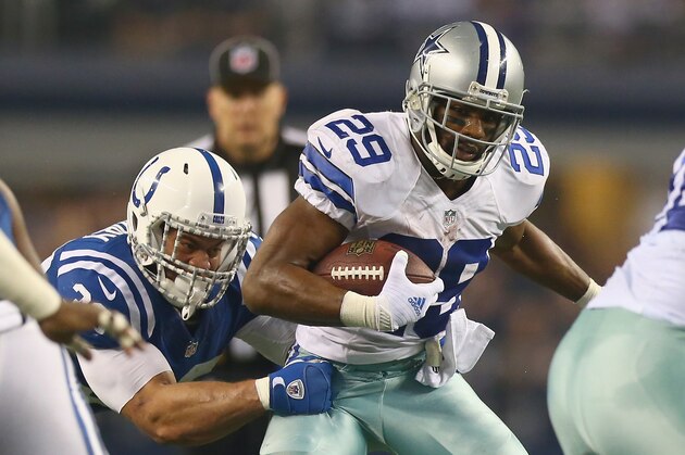ARLINGTON, TX - DECEMBER 21:   DeMarco Murray #29 of the Dallas Cowboys runs the ball against the Indianapolis Colts in the third quarter at AT&T Stadium on December 21, 2014 in Arlington, Texas.  (Photo by Ronald Martinez/Getty Images)