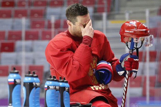 Russia forward Ilya Kovalchuk takes a break during a training session at the Bolshoy Ice Dome at the the 2014 Winter Olympics, Tuesday, Feb. 11, 2014, in Sochi, Russia. (AP Photo/Julio Cortez)
