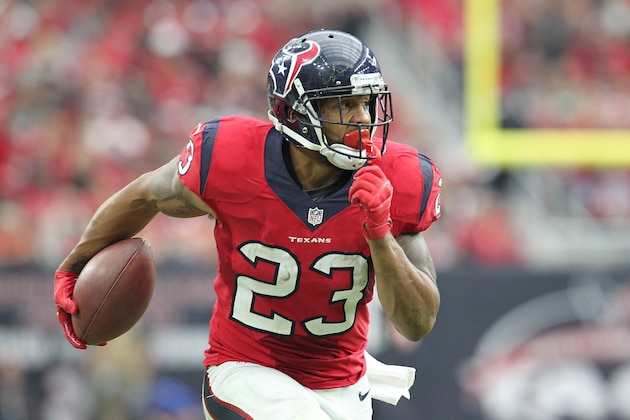 HOUSTON, TX- NOVEMBER 02: Arian Foster #23 of the Houston Texans runs after the catch for a touchdown against the Philadelphia Eagles in the second quarter in a NFL game on November 2, 2014 at NRG Stadium in Houston, Texas. (Photo by Thomas B. Shea/Getty Images)