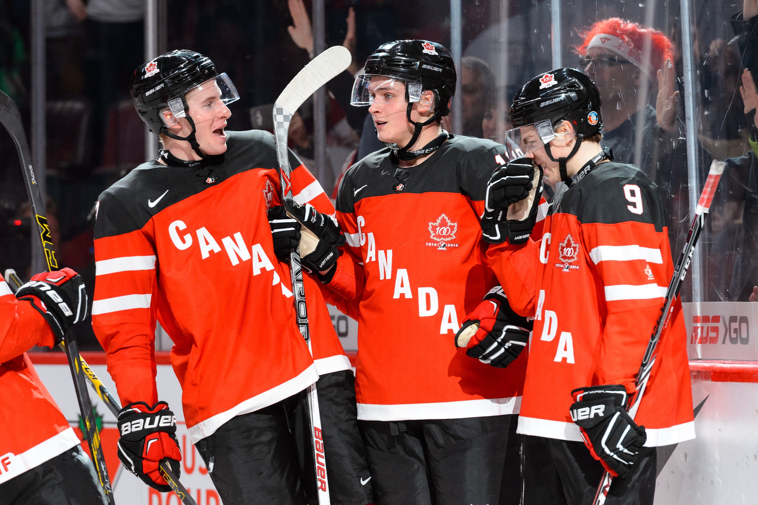 MONTREAL, QC - DECEMBER 26:  Jake Virtanen #18 of Team Canada celebrates his goal with teammates during the 2015 IIHF World Junior Hockey Championship game against Team Slovakia at the Bell Centre on December 26, 2014 in Montreal, Quebec, Canada.  Team Canada defeated Team Slovakia 8-0.  (Photo by Minas Panagiotakis/Getty Images)