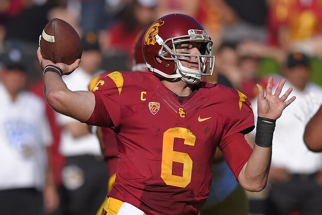 Southern California quarterback Cody Kessler prepares to pass during the first half of an NCAA college football game against Notre Dame, Saturday, Nov. 29, 2014, in Los Angeles. (AP Photo/Mark J. Terrill)