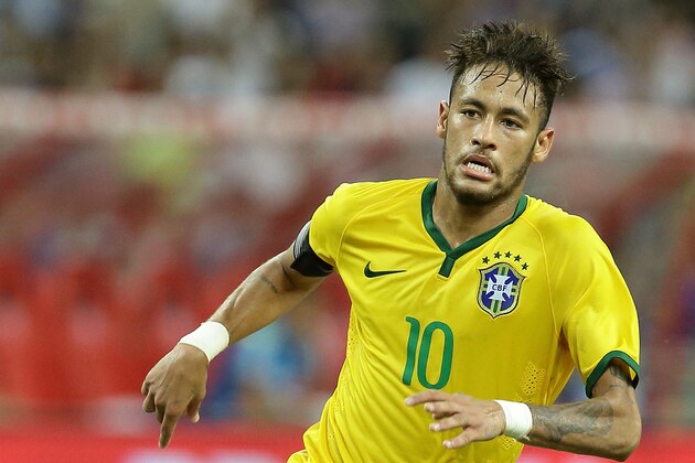 SINGAPORE - OCTOBER 14:  Neymar of Brazil in action during the international friendly match between Japan and Brazil at the National Stadium on October 14, 2014 in Singapore.  (Photo by Suhaimi Abdullah/Getty Images)
