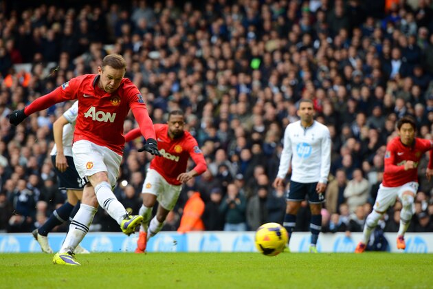 LONDON, ENGLAND - DECEMBER 01: Wayne Rooney of Manchester United scores their second goal from the penalty spot during the Barclays Premier League Match between Tottenham Hotspur and Manchester United at White Hart Lane on December 1, 2013 in London, England.  (Photo by Michael Regan/Getty Images)