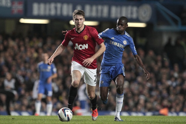 Chelsea's Ramires, right, competes with Manchester United's Nick Powell during their English League Cup fourth round soccer match at Stamford Bridge, London, Wednesday, Oct. 31, 2012. (AP Photo/Sang Tan)