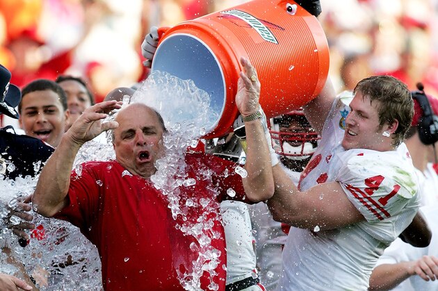 ORLANDO, FL - JANUARY 2:  Head coach Barry Alvarez of the Wisconsin Badgers is doused by linebacker Mark Zalewski #41 after defeating the Auburn Tigers during the Capital One Bowl on January 2, 2006 at the Florida Citrus Bowl in Orlando, Florida. Wisconsin defeated Auburn 24-10 in Alvarez's last game before retiring.  (Photo by Doug Benc/Getty Images)