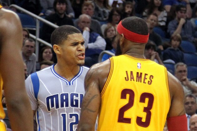 Dec 26, 2014; Orlando, FL, USA; Orlando Magic forward Tobias Harris (12) and Cleveland Cavaliers forward LeBron James (23) both get called for a double technical foul during the second half at Amway Center. Cleveland Cavaliers defeated the Orlando Magic 98-89. Mandatory Credit: Kim Klement-USA TODAY Sports
