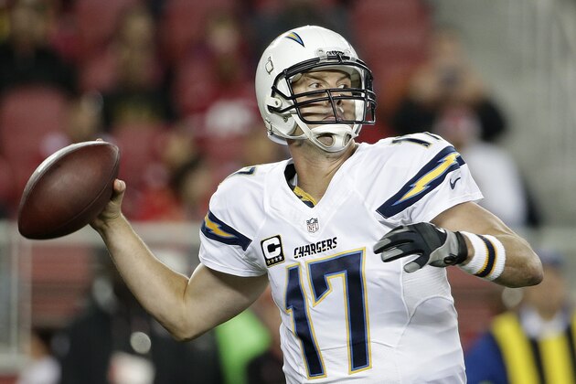 San Diego Chargers quarterback Philip Rivers (17) passes against the San Francisco 49ers during the first quarter of an NFL football game in Santa Clara, Calif., Saturday, Dec. 20, 2014. (AP Photo/Marcio Jose Sanchez)