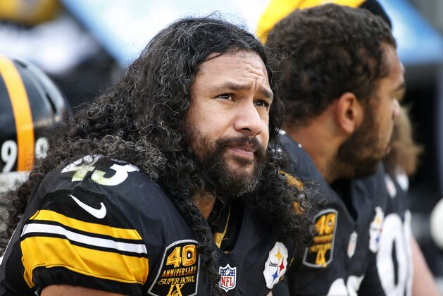 Pittsburgh Steelers strong safety Troy Polamalu (43) sits on the sideline during the second half of an NFL football game against the New Orleans Saints in Pittsburgh, Sunday, Nov. 30, 2014. (AP Photo/Gene J. Puskar)