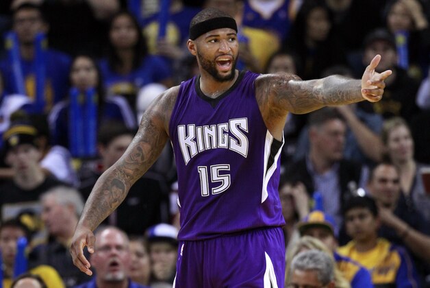 Sacramento Kings' DeMarcus Cousins (15) argues a call against the Golden State Warriors during the second half of an NBA basketball game Monday, Dec. 22, 2014, in Oakland, Calif. Golden State won 128-108.(AP Photo/Marcio Jose Sanchez)