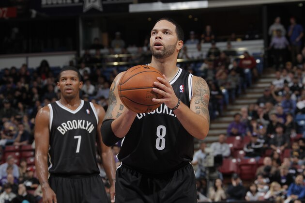 SACRAMENTO, CA - NOVEMBER 18: Deron Williams #8 of the Brooklyn Nets attempts a free throw shot against the Sacramento Kings on November 18, 2012 at Sleep Train Arena in Sacramento, California. NOTE TO USER: User expressly acknowledges and agrees that, by downloading and or using this photograph, User is consenting to the terms and conditions of the Getty Images Agreement. Mandatory Copyright Notice: Copyright 2012 NBAE (Photo by Rocky Widner/NBAE via Getty Images)
