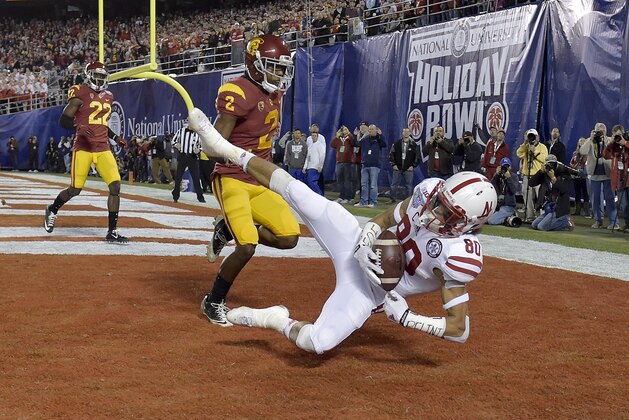 SAN DIEGO, CA-  DECEMBER 27: Wide Receiver Kenny Bell #80 of the Nebraska Cornhuskers catches a touchdown pass against Adoree Jackson #2 of the USC Trojans during the National University Holiday Bowl on December 27, 2014 at Qualcomm Stadium in San Diego, California. (Photo by Donald Miralle/Getty Images)