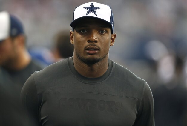 Sep 7, 2014; Arlington, TX, USA; Dallas Cowboys practice squad player Michael Sam on the sidelines during the game against the San Francisco 49ers at AT&T Stadium. Mandatory Credit: Matthew Emmons-USA TODAY Sports