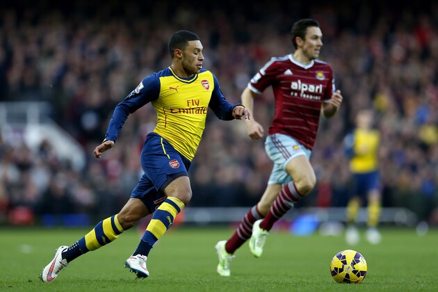 LONDON, ENGLAND - DECEMBER 28:  Alex Oxlade-Chamberlain of Arsenal in action during the Barclays Premier League match between West Ham United and Arsenal at Boleyn Ground on December 28, 2014 in London, England.  (Photo by Steve Bardens/Getty Images)