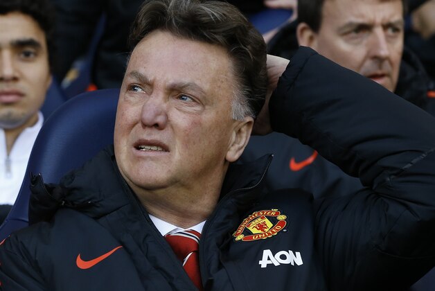 Manchester United's Louis van Gaal ahead of the English Premier League soccer match between Tottenham Hotspur and Manchester United at White Hart Lane Stadium in London, Sunday, Dec. 28, 2014. (AP Photo/Kirsty Wigglesworth)