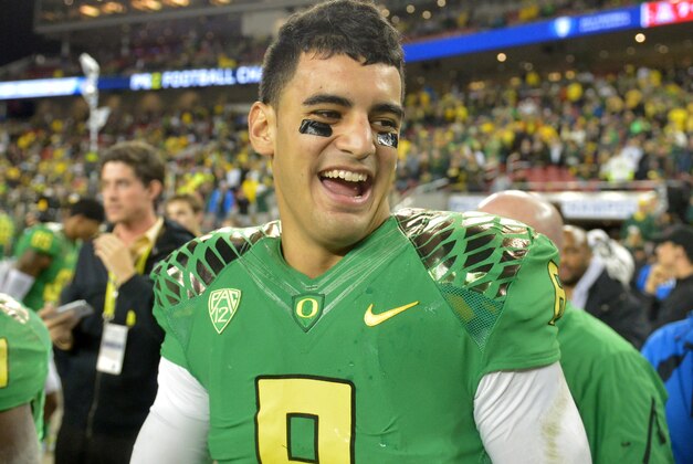 Dec 5, 2014; Santa Clara, CA, USA; Oregon Ducks quarterback Marcus Mariota (8) smiles after the Pac-12 Championship game against the Arizona Wildcats at Levi's Stadium. Mandatory Credit: Kirby Lee-USA TODAY Sports Dec 5, 2014; Santa Clara, CA, USA; Oregon Ducks quarterback Marcus Mariota (8) smiles after the Pac-12 Championship game against the Arizona Wildcats at Levi's Stadium. Mandatory Credit: Kirby Lee-USA TODAY Sports