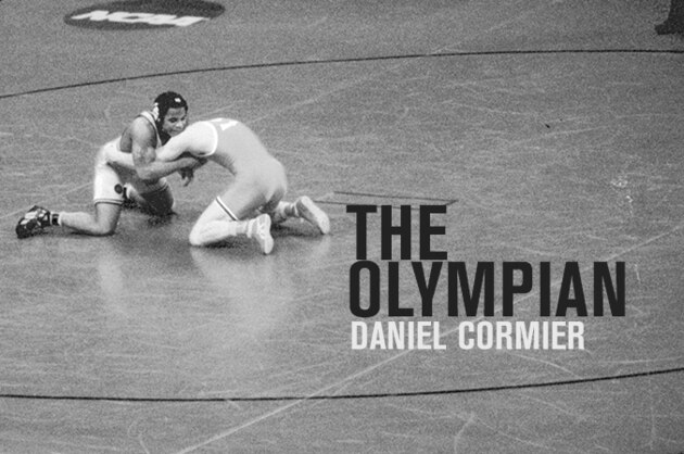 Daniel Cormier, right, reacts as the referee stops his UFC 170 mixed martial arts light heavyweight fight against Patrick Cummins on Saturday, Feb. 22, 2014, in Las Vegas. (AP Photo/Isaac Brekken)