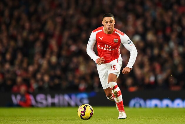 LONDON, ENGLAND - DECEMBER 13:  Alex Oxlade-Chamberlain of Arsenal in action during the Barclays Premier League match between Arsenal and Newcastle United at Emirates Stadium on December 13, 2014 in London, England.  (Photo by Mike Hewitt/Getty Images)