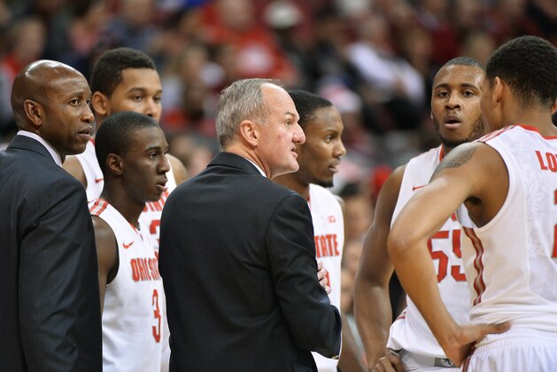 COLUMBUS, OH - NOVEMBER 14:  Head Coach Thad Matta of the Ohio State Buckeyes talks to his team during a timeout in a game against the Massachusetts-Lowell River Hawks on November 14, 2014 at Value City Arena in Columbus, Ohio. Ohio State defeated Massachusetts-Lowel 92-55.  (Photo by Jamie Sabau/Getty Images)