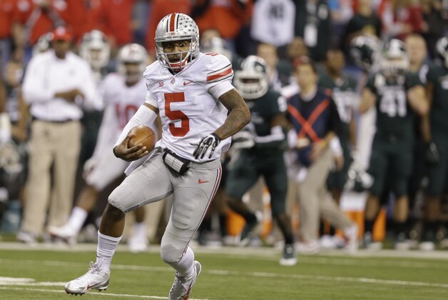 Ohio State's Braxton Miller (5) runs during the second half of a Big Ten Conference championship NCAA college football game against Michigan State Saturday, Dec. 7, 2013, in Indianapolis. (AP Photo/Michael Conroy)