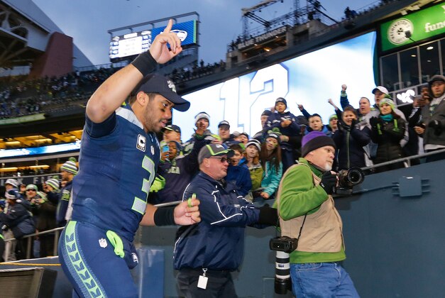 Dec 28, 2014; Seattle, WA, USA; Seattle Seahawks quarterback Russell Wilson (3) returns to the locker room following a 20-6 victory against the St. Louis Rams at CenturyLink Field. Mandatory Credit: Joe Nicholson-USA TODAY Sports