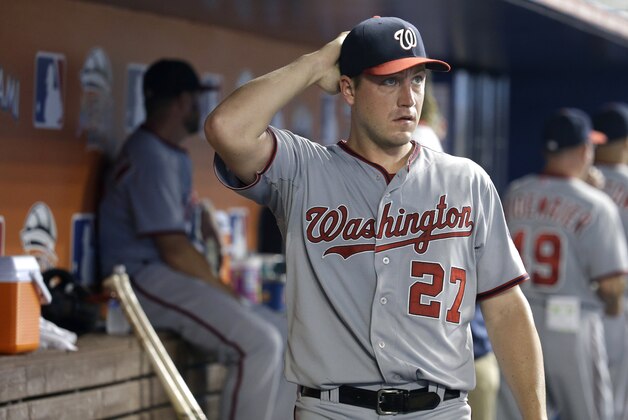 Washington Nationals starting pitcher Jordan Zimmermann (27) looks out from the dugout during a baseball game against the Miami Marlins, Monday, July 28, 2014, in Miami. (AP Photo/Lynne Sladky)