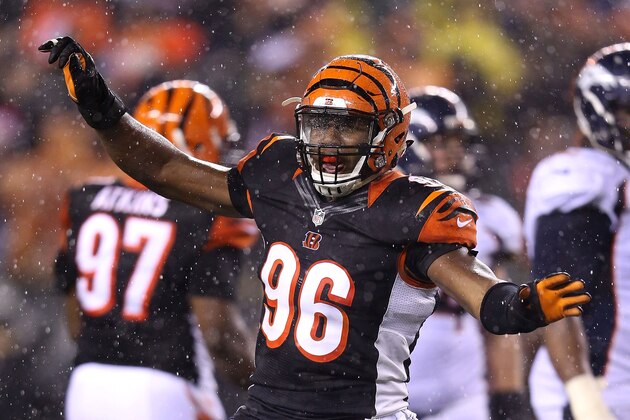 CINCINNATI, OH - DECEMBER 22:  Carlos Dunlap #96 of the Cincinnati Bengals celebrates after sacking Peyton Manning #18 of the Denver Broncos during the fourth quarter at Paul Brown Stadium on December 22, 2014 in Cincinnati, Ohio. Cincinnati defeated Denver 37-28. (Photo by Andy Lyons/Getty Images)