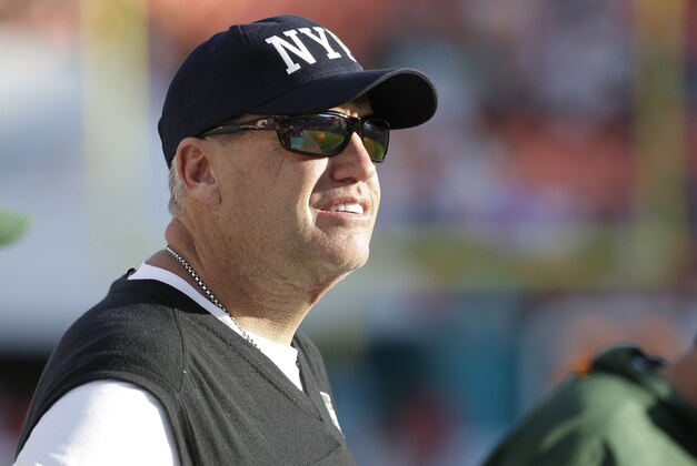 New York Jets head coach Rex Ryan looks up from the sidelines during the second half of an NFL football game against the Miami Dolphins, Sunday, Dec. 28, 2014, in Miami Gardens, Fla. (AP Photo/Lynne Sladky)