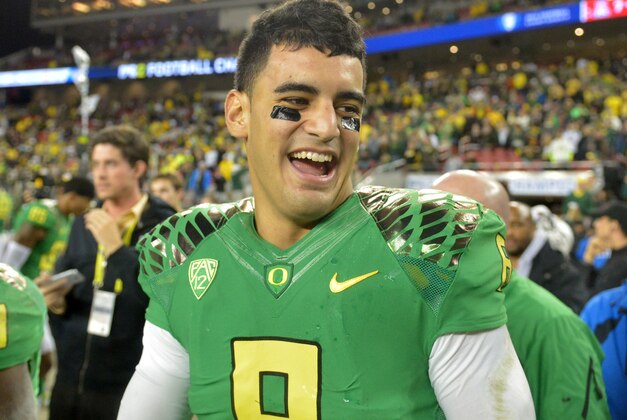 Dec 5, 2014; Santa Clara, CA, USA; Oregon Ducks quarterback Marcus Mariota (8) smiles after the Pac-12 Championship game against the Arizona Wildcats at Levi's Stadium. Mandatory Credit: Kirby Lee-USA TODAY Sports