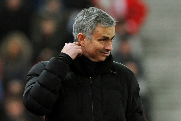 Chelsea manager Jose Mourinho reacts during the English Premier League soccer match between Stoke City and Chelsea at the Britannia Stadium, in Stoke on Trent, England, Monday, Dec. 22, 2014. (AP Photo/Rui Vieira)