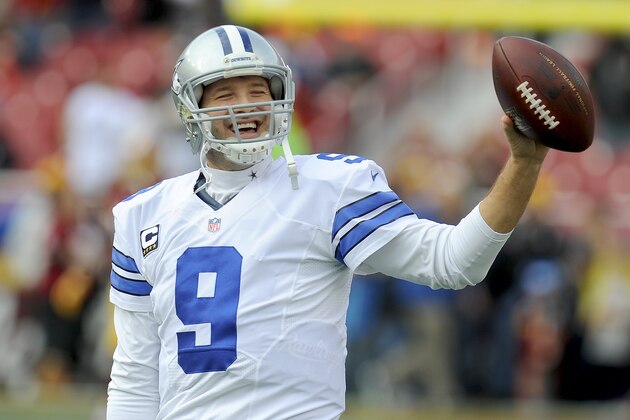 Dallas Cowboys quarterback Tony Romo (9) warms up before an NFL football game against the Washington Redskins in Landover, Md., Sunday, Dec. 28, 2014. (AP Photo/Richard Lipski)