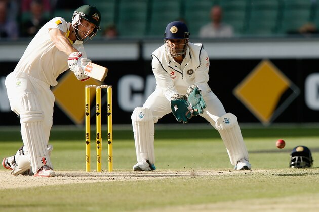 MELBOURNE, AUSTRALIA - DECEMBER 29: Shaun Marsh of Australia plays a shot through the off side  during day four of the Third Test match between Australia and India at Melbourne Cricket Ground on December 29, 2014 in Melbourne, Australia..  (Photo by Darrian Traynor/Getty Images)