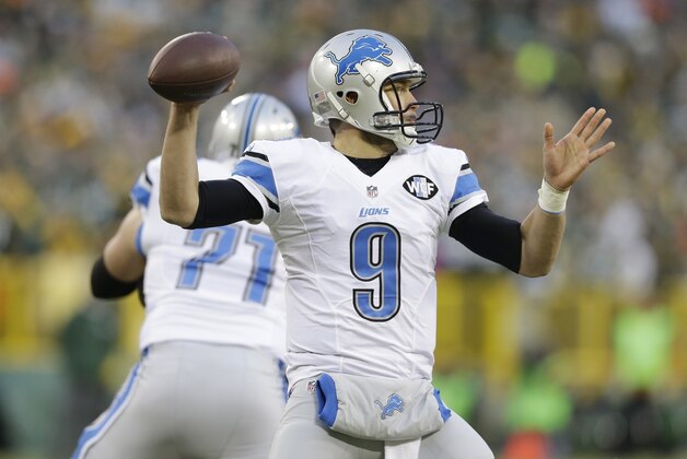 Detroit Lions' Matthew Stafford during the first half of an NFL football game against the Green Bay Packers Sunday, Dec. 28, 2014, in Green Bay, Wis. (AP Photo/Tom Lynn)