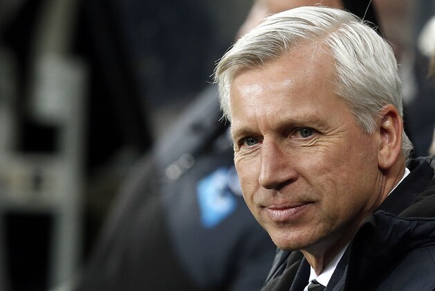 Newcastle United's manager Alan Pardew awaits the start of their English Premier League soccer match between Newcastle United and Everton at St James' Park, Newcastle, England, Sunday, Dec. 28, 2014. (AP Photo/Scott Heppell)