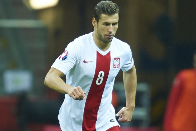 WARSAW, POLAND - OCTOBER 14: Poland's Grzegorz Krychowiak controls the ball during the UEFA EURO 2016 qualifying match between Poland and Scotland on October 14, 2014 on the National Stadium in Warsaw, Poland. (Photo by Adam Nurkiewicz/Getty Images)