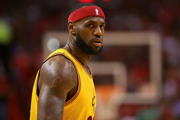 MIAMI, FL - DECEMBER 25:  LeBron James #23 of the Cleveland Cavaliers looks on during a game against the Miami Heat at American Airlines Arena on December 25, 2014 in Miami, Florida. NOTE TO USER: User expressly acknowledges and agrees that, by downloading and/or using this photograph, user is consenting to the terms and conditions of the Getty Images License Agreement. Mandatory copyright notice:  (Photo by Mike Ehrmann/Getty Images)
