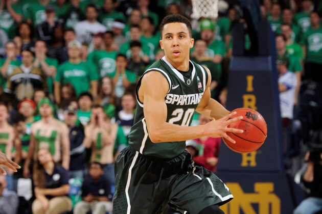 Michigan State guard Travis Trice heads up court during the first half of an NCAA college basketball game with Notre Dame Wednesday Dec. 3, 2014, in South Bend, Ind.  (AP Photo/Joe Raymond)
