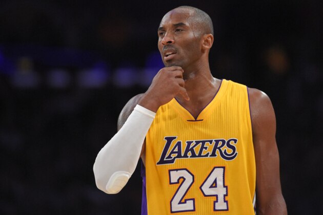 Los Angeles Lakers guard Kobe Bryant gestures during the second half of an NBA basketball game against the Oklahoma City Thunder, Friday, Dec. 19, 2014, in Los Angeles. (AP Photo/Mark J. Terrill)