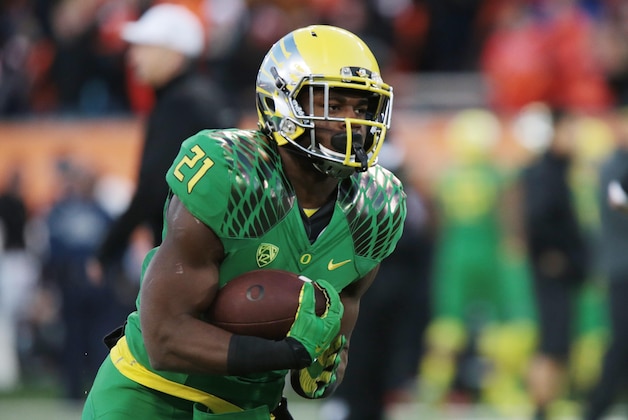 Nov 29, 2014; Corvallis, OR, USA; Oregon Ducks running back Royce Freeman (21) runs the ball before the game against the Oregon State Beavers at Reser Stadium. Mandatory Credit: Scott Olmos-USA TODAY Sports Nov 29, 2014; Corvallis, OR, USA; Oregon Ducks running back Royce Freeman (21) runs the ball before the game against the Oregon State Beavers at Reser Stadium. Mandatory Credit: Scott Olmos-USA TODAY Sports